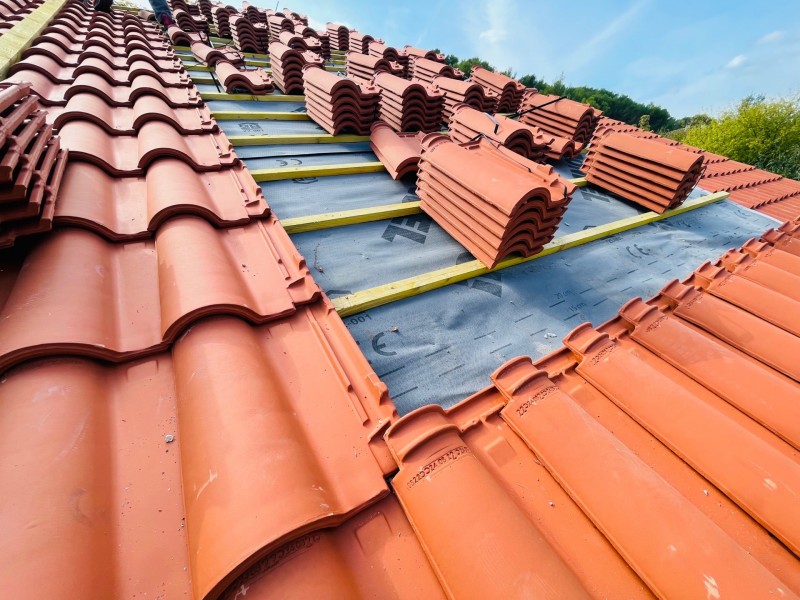 pose de tuile mecanique sur ventbren