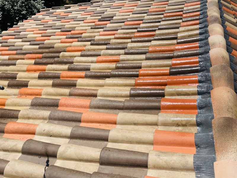 demoussage et traitement de toiture sur mimet