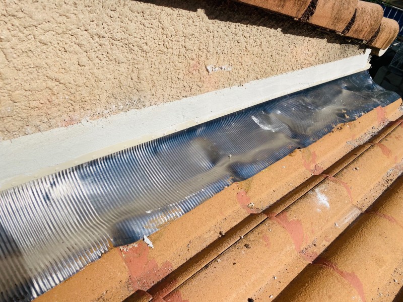 Solin avec finition enduit sur vitrolles