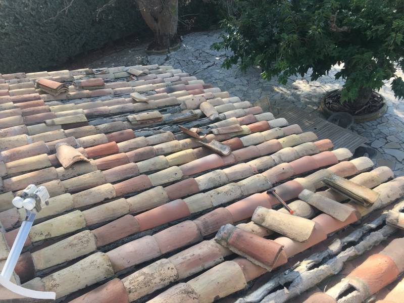 dépose de tuiles sur bouc bel air